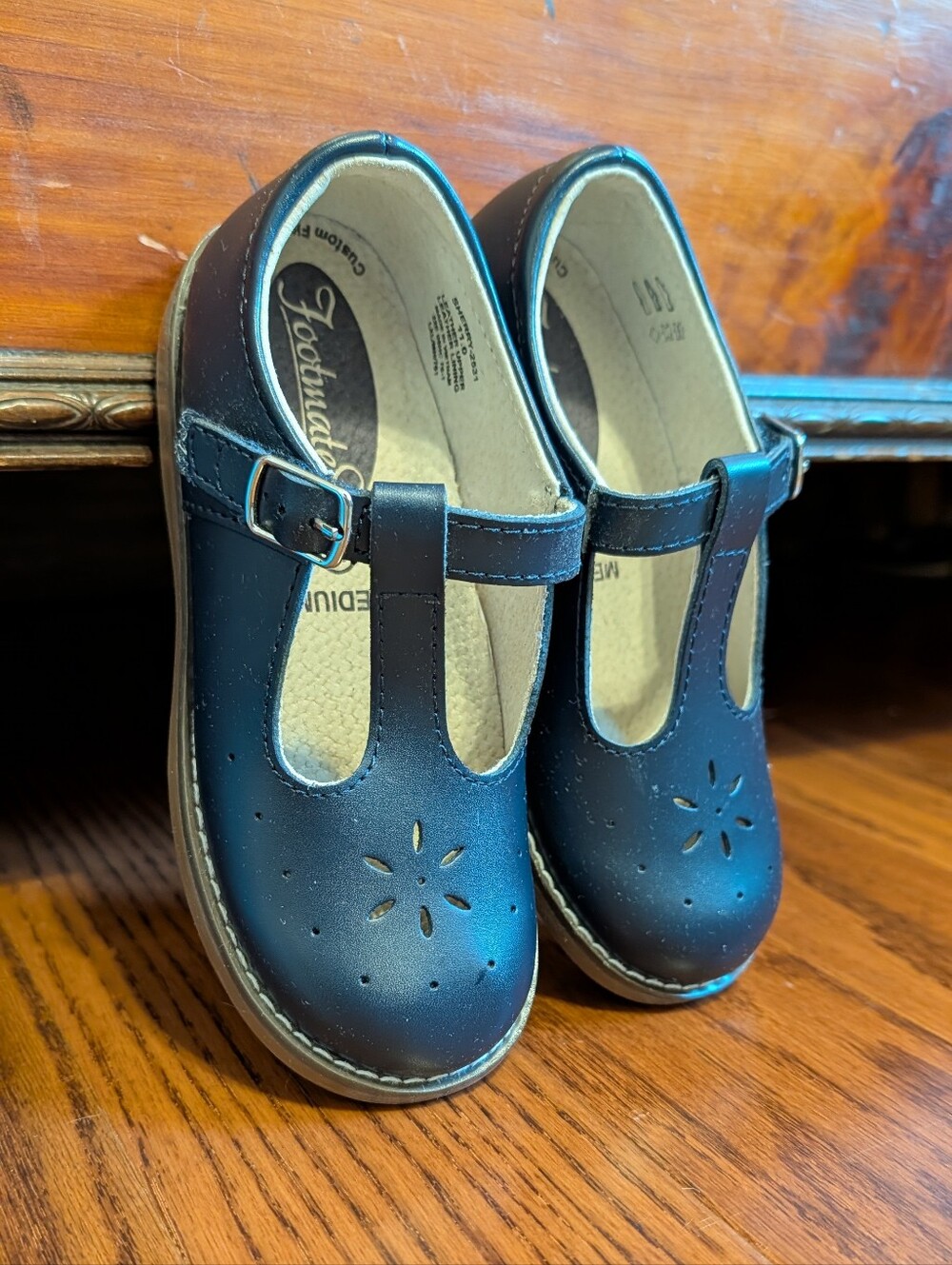 FootMates Navy "Sherry" Girls T‑Strap Mary Jane Shoes with Floral Cutouts
